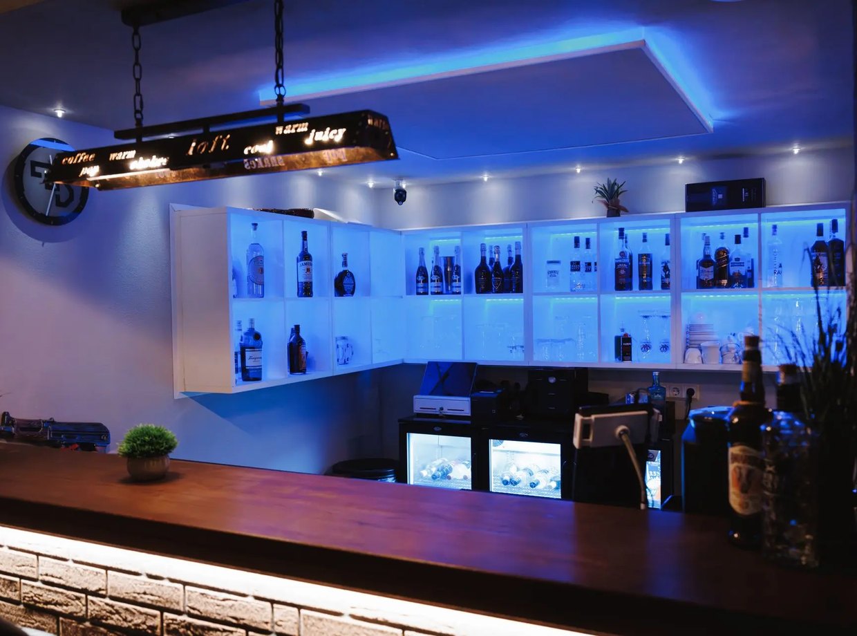 ApexLounge bar with illuminated shelves
